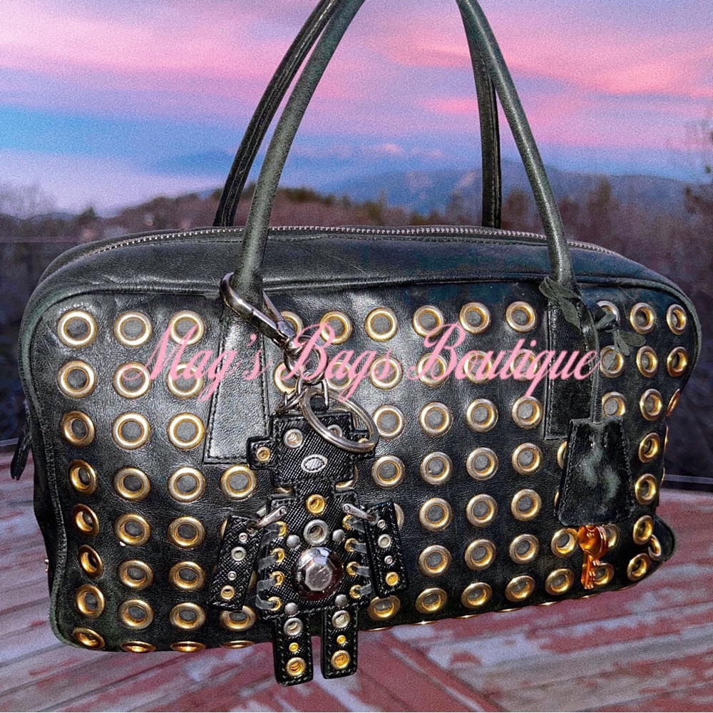 Prada: Grommet Robot Keychain With Lock & Key Tot… - image 1